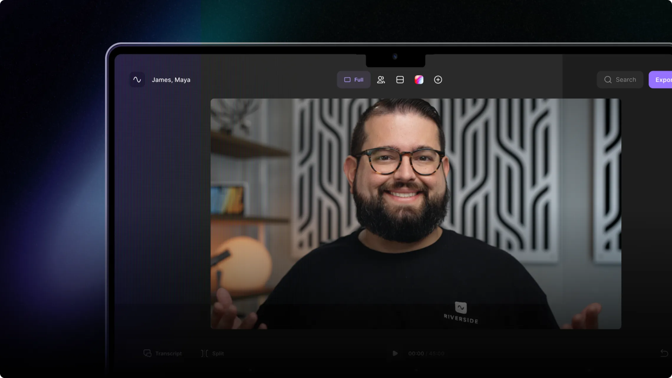 Smiling bearded man wearing glasses and a black Riverside shirt in a video call interface on a laptop screen.